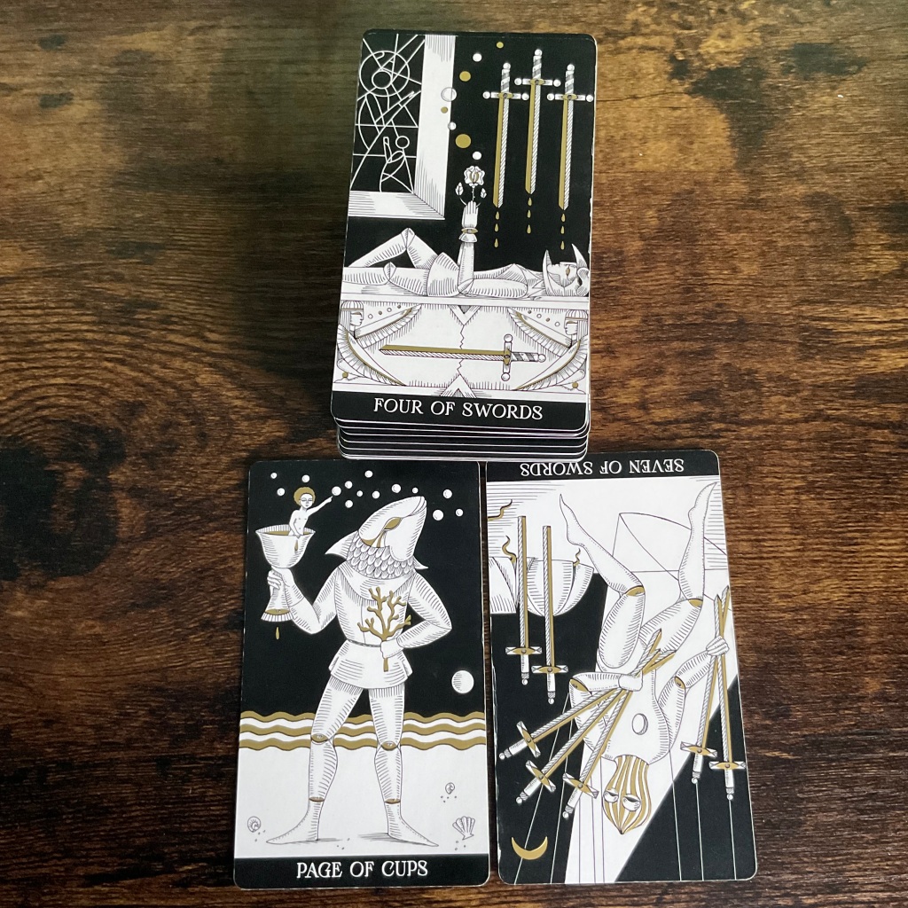 Page of cups, Four of Swords and Seven of Swords from the Symbolic Soul Tarot