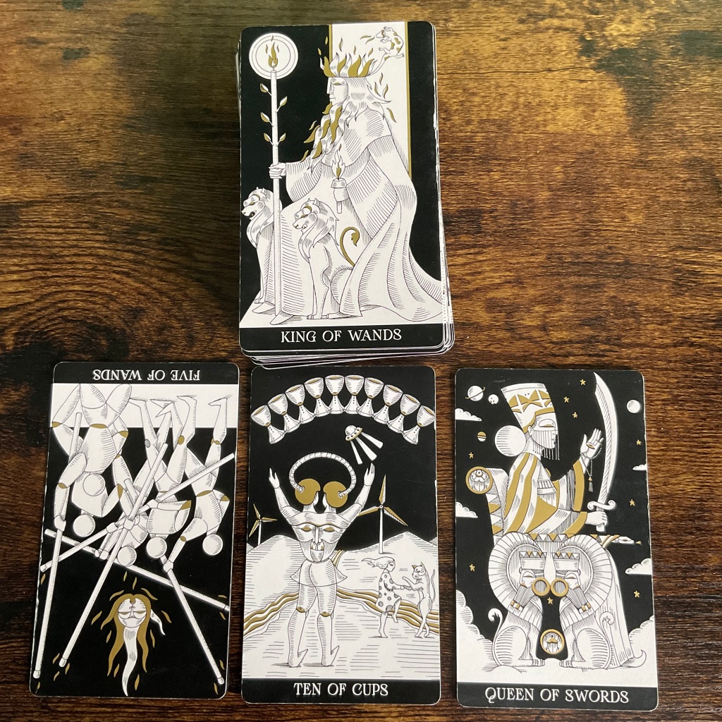 Five of Wands, Ten of Cups, Queen of Swords and King of wands from the Symbolic Soul Tarot