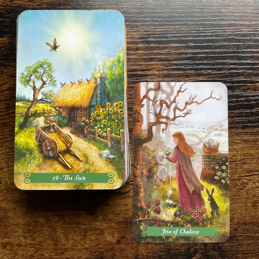 Five of Chalices and the Sun by Green Witch Tarot